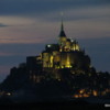 Mont St. Michel, Normandy, at dusk, viewed from dam at La Caserne: The Mont is even more impressive when lite up at night!