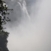 Victoria Falls, Zimbabwe side: Viewed from the west.  "The Smoke that Thunders".  During the wet season the mist is so intense you get drenched and really can't see much
