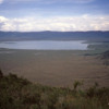Overview of the Ngorongoro Crater, Tanzania: An imploded volcanic crater, high enough to cause enough rain to keep vegetation green year round.  The animals here don't need to migrate.