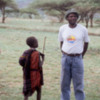 Maasai, Tanzania.: A boy talking with one of our guides