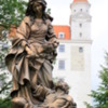 Bratislava -- St. Elizabeth statue: Elizabeth was a 13th century princess who was raised in Bratislava Castle, seen in the background. When her husband died she took a vow of poverty and devoted her life to the service of others.