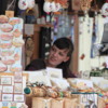 Bratislava -- Street vendor: A pretty Slovak girl at one of the many booths in the plaza