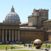 Courtyard at the Vatican Museum: The dome of St. Peter's Basilica is to the left of center