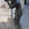 "Photographer".  Another statue from Bratislava, Slovakia: Peering around a corner, zooming in, framing it just right.  Could be me!