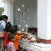 Anuradhapura -- Thuparama Dagoba: The pilgrims leave gifts of flowers