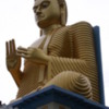 Entrance to Dambulla: A 30 m tall statue of the Buddha greets you as you enter the complex.