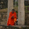 Kandy -- Buddhist monk at the Temple of the Tooth: A fellow in a contemplative mood