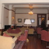 Nuwara Eliya -- Grand Hotel: A cozy sitting room at the front of the hotel. Where else in Sri Lanka would you have wood burning fire places?