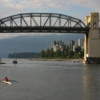 Burrard Bridge, Vancouver, British Columbia, Canada: Stanley park is seen in the distance, framed by the bridge's pillars