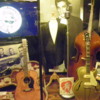 Sun Studio museum exhibit: Elvis Presleys guitar, Bill Blacks upright bass, Scotty Moores guitar, and a jacket Elvis wore on the "Dorsey Brothers Stage Show" January 28, 1956