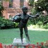 Buenos Aires, Jardin Botanico: One of dozens of statues in the park.  Not sure if this one is offering water or mate.