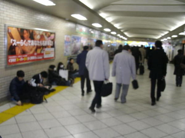 People at Ikebukuro Station Staying Warm