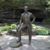 Lynchburg -- Jack Daniel's statue: A statue of Mr Daniels outside the cave from which originates the spring water used to make Jack Daniel's whiskey. This water is iron-free, important in the making of whiskey.