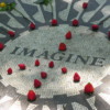 "Imagine" mosaic of inlaid stones, the focal point of Strawberry Fields.: Central Park, New York, New York.
