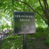 Strawberry Fields sign post located in beautiful Central Park, New York, New York.