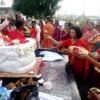 Praan Prathistaa Ceremony - A Legacy for Granny: Granny and her two daughters continue to perform Aarti on the murti before it is taken inside.