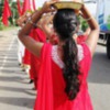 Praan Prathistaa Ceremony - A Legacy for Granny: The seven girls walking proudly carrying their thalis on their heads.