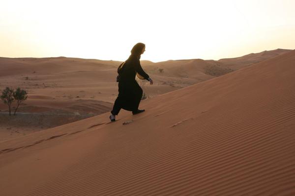 Saudi Arabia Riyadh, Climbing the Sands in an abaya