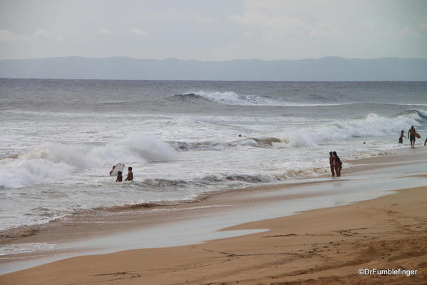 Hurricane Ana approaches Kauai's southern shore near Kekaha. Surfers enjoyed the wave swells