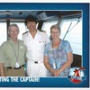 Bernard and Janice Caffary post on the bridge of Carnival Sensation (Photo courtesy Carnival Cruise Line)