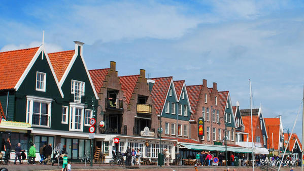 The Volendam waterfront is lines with restaurants, shops and photo galleries