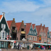 The Volendam waterfront is lines with restaurants, shops and photo galleries