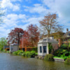 Historic tea houses line a canal in Edam.