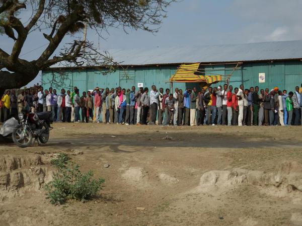 Lines of people waiting to vote
