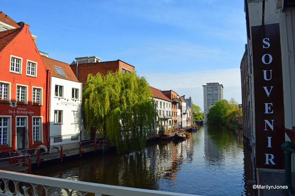 Canals wind through the city mirroring canal houses and centuries-old commercial buildings.