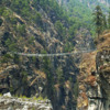 A high footbridge before the ascent into Namche.  Courtesy Wikimedia and Steve Hicks
