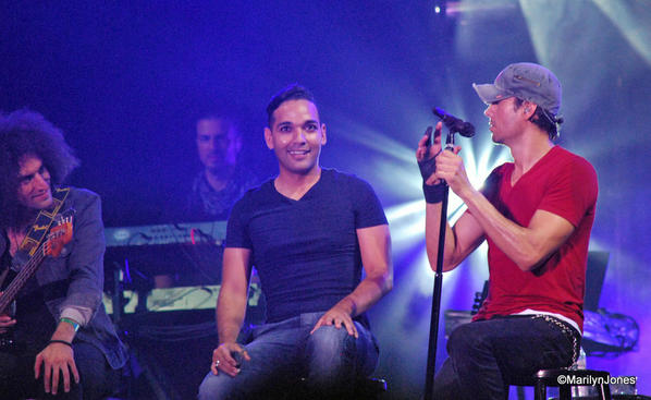 Enrique Iglesias (right) invited a fan to sing with him on stage.