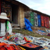 Women selling souvenirs,  Uros Island, Lake Titicaca.  Courtesy Yoli Marcela Hernandez and Wikimedia