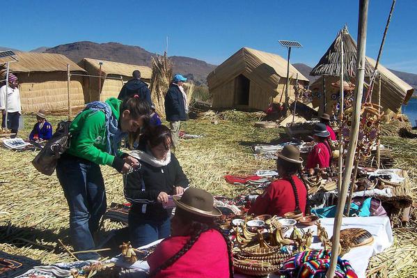 Women selling souvenirs, Uros Island, Lake Titicaca. Courtesy Alfredobi and Wikimedia - Copy