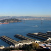 View of San Francisco from the Coit Tower.: Pictured is Treasure Island and the Sanfrancisco-Oakland Bay Bridge.
