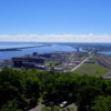 View from Enger Tower: Looking east, foreground is Enger Hill, in the background we see the skinny sandspit of Park Point (the world's longest freshwater sandbar), Rice's Point with its many grain elevators and rail traffic, and the Highway 53 bridge connecting MN to WI.