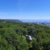View from Enger Tower: Looking north, we see Enger Hill in the foreground, and in the background we see the city of Duluth, the north shore of Lake Superior, Canal park with the iconic Aerial Lift Bridge, and Duluth Harbor Basin.