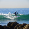 Surfing at Crystal Cove State Park, Newport Beach, California