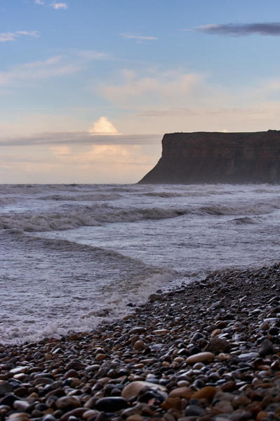 Hunt cliff, clouds and tide.