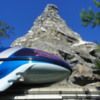 Disneyland Monorail passes by the Matterhorn.