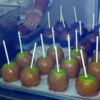 Creating caramel apple works of art.: Marceline's Confectionery, Downtown Disney, California