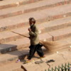 Sweeping the steps,  Jama Masjid, Delhi