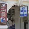 Signs outside the Grand Oriental Hotel, Colombo