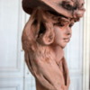 Paris' Rodin Museum.  Girl in a flowered hat