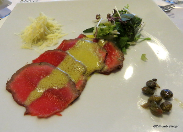 04 Beef Carpaccio, with dijon mustard dressing, Parmesan cheese, capers & artichokes