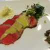 Beef Carpaccio, with dijon mustard dressing, Parmesan cheese, capers &amp; artichokes