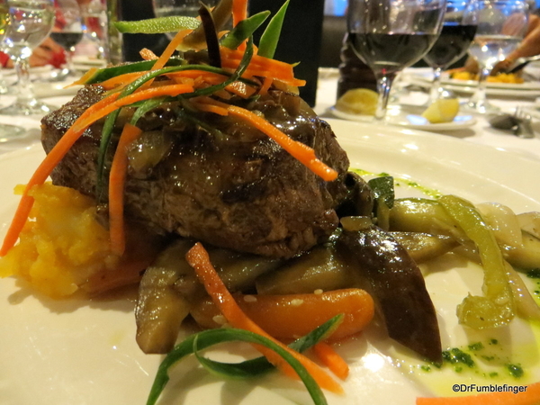 11 beef filet tournedos with hunter sauce, mashed potatoes and oriental style vegeatables