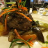 Beef filet tournedos with hunter sauce, mashed potatoes and oriental style vegeatables