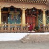 Phunaka Dzong (“Palace of Great Happiness”) with monk at the temple