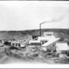 1920px-Gold_mines_and_mining_facilities,_Goldfield,_Nevada,_ca.1904_(CHS-5423)