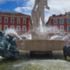 Apollo statue and fountain in city center